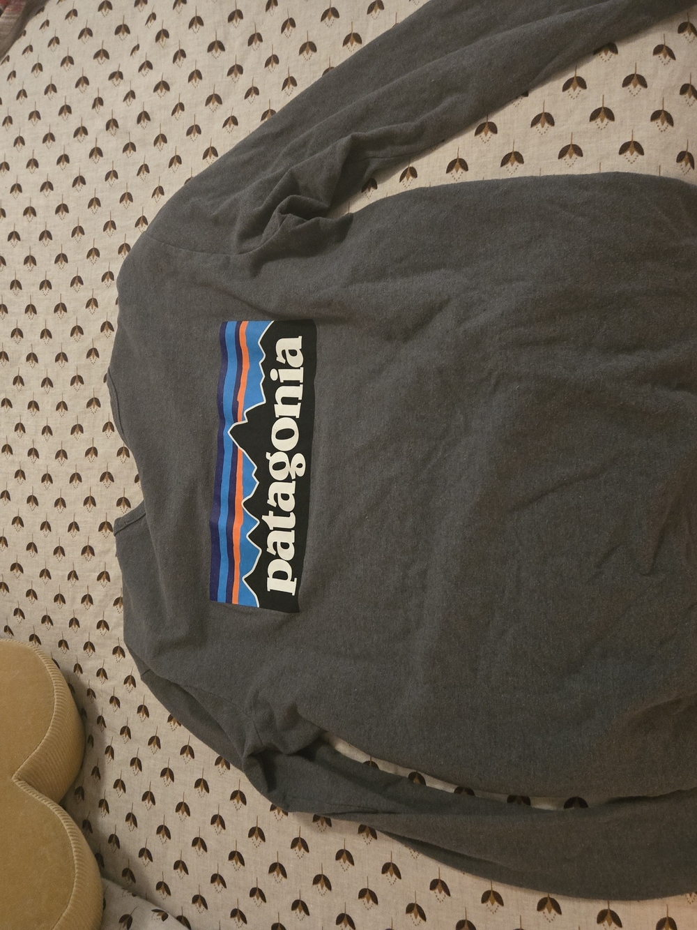 Patagonia Dark Gray Long Sleeve Shirt with Blue and Orange Logo
